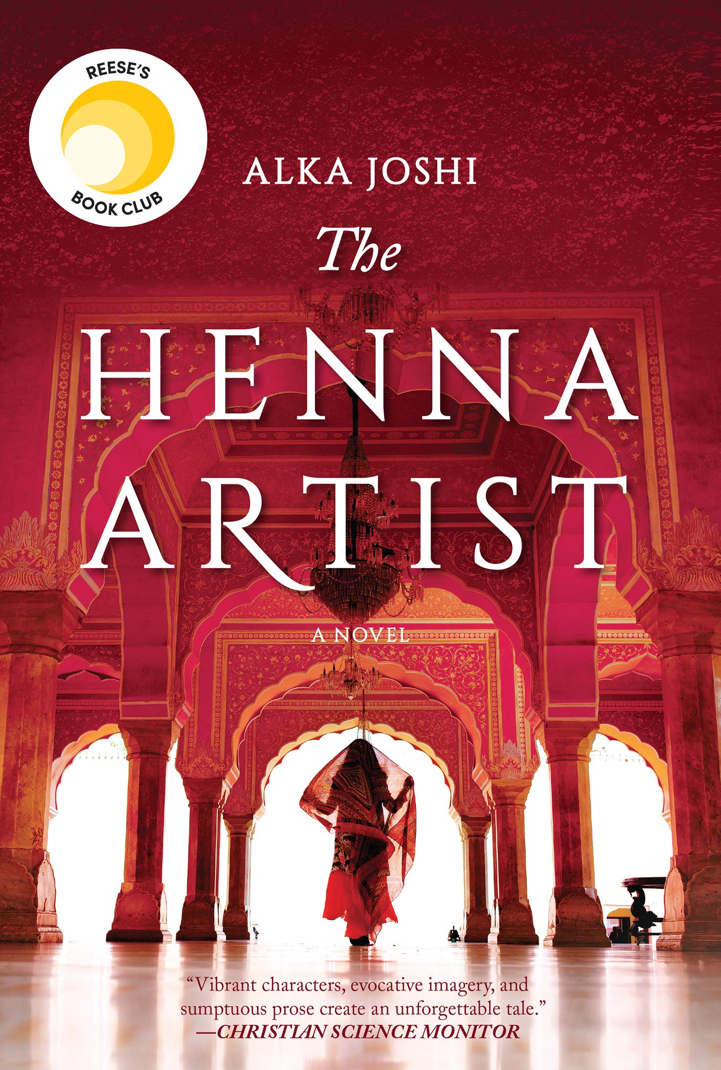 The Henna Artist by Alka Joshi book cover done in reds with what looks like an Indian temple and a woman in a red sari walking through the center. Reese Witherspoon book club logo on top left corner.