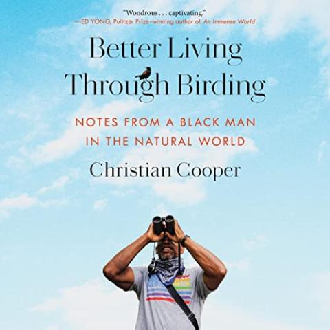 Better Living Through Birding by Christian Cooper book cover - author standing against a blue sky holding binoculars and looking up.
