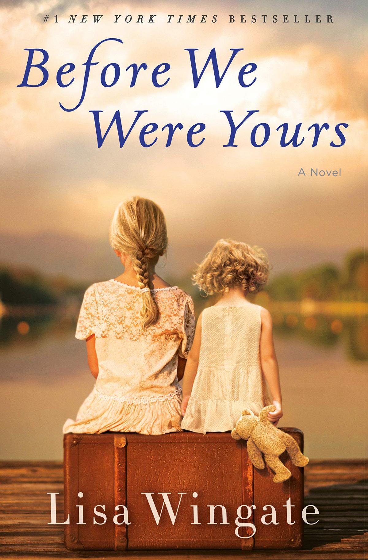 Before We Were Yours book cover with two little girls with their backs to the reader sitting on a suitcase done in sepia tones